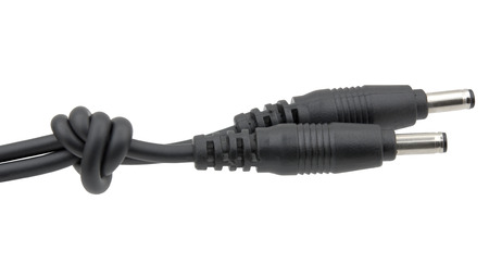 Cable from charging device on white background