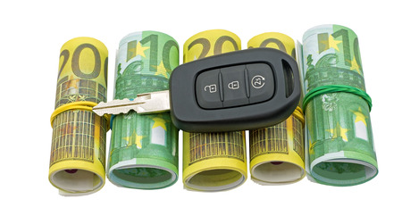 euros banknotes and car key on white backgroundの写真素材