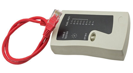 Network cable tester with UTP cable isolated on white background