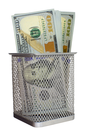 Decoration with dollar paper banknotes in Refuse bin on white backgroundの写真素材