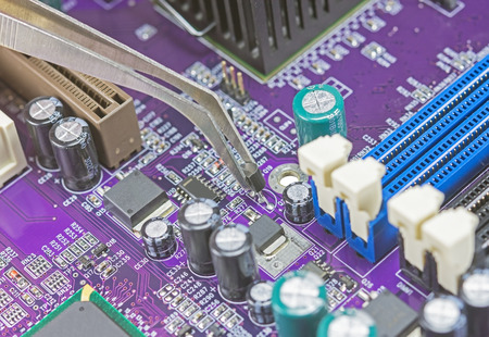 Empty CPU processor socket with pins on motherboardの写真素材