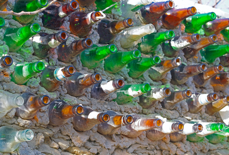 a fence from drunk bottlesの写真素材