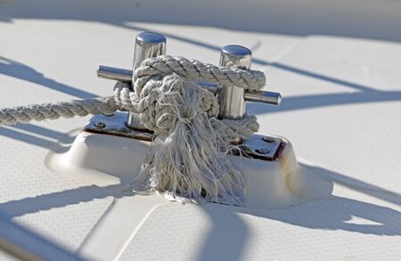 Mooring ropes and bollards used for securing the ship to the harbour
