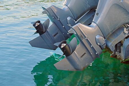boat propellers on hub of outboard motor close up