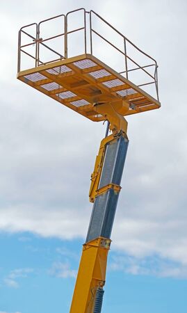 A cabin crane car to for in high area for safety and convenience work against the blue sky