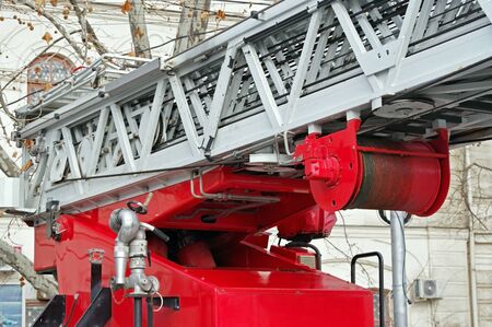 drum with a metal cable for lifting stairs on a fire truckの写真素材