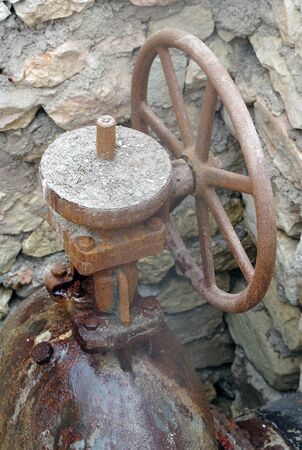 water supply system and old very rust gate valvesの写真素材