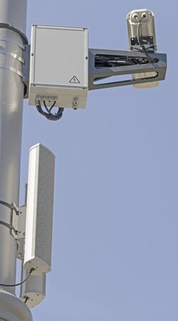 Spherical IP security camera on background of blue sky