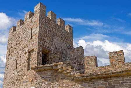 ancient historic Genoese castle or fortress against the blue skyの写真素材
