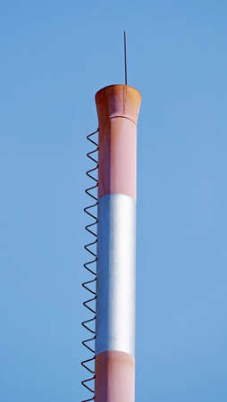 smokestack on background of blue sky