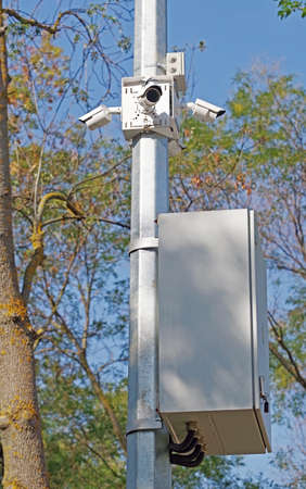 Spherical IP security camera on background of blue sky