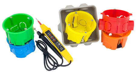 plastic electrical junction box and Voltage tester isolated on white background