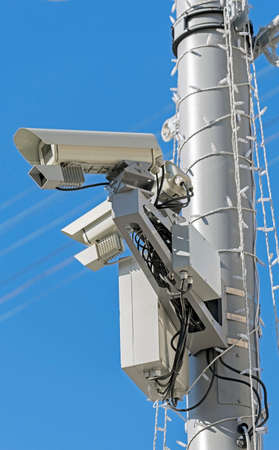 Spherical IP security camera on background of blue sky