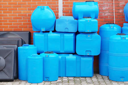 Blue plastic water and liquids barrel storage industrial containersの写真素材