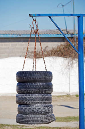 black Punching bag from old car tires for boxing or kick boxing sportの写真素材