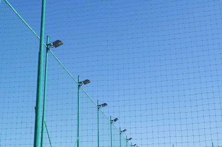 The Stadium Spot-light tower over Blue Sky