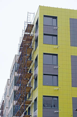 building under construction on a white background