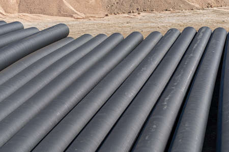 black plastic pipes for water supply or sewerage prepared for installation or repair of the water...