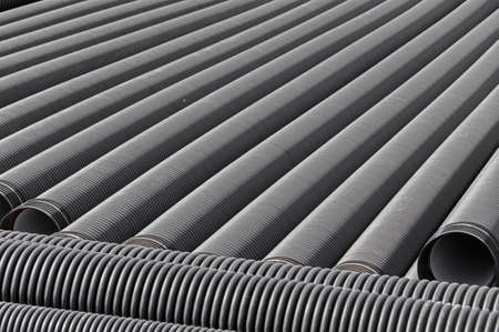 black plastic pipes for water supply or sewerage prepared for installation or repair of the water...