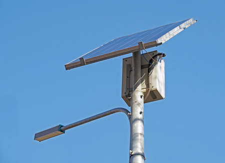 Street Light powered by a solar panel with a batteryの写真素材