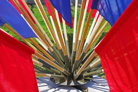 Flags of different colors stand in a special metal structureの写真素材