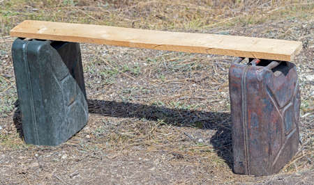 old wooden bench from fuel cans