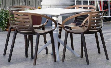 the chairs and tables in the summer cafeの写真素材