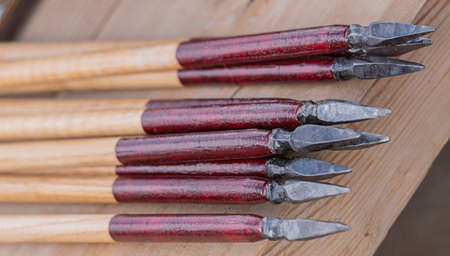 arrows for Roman crossbow on a wooden tableの写真素材