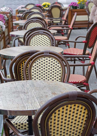 the chairs and tables in the summer cafeの写真素材