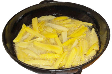 Fried potatoes on the iron frying pan