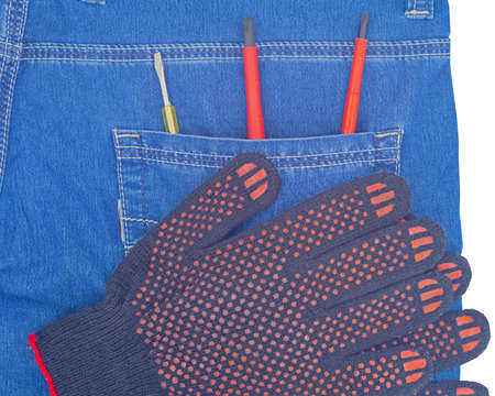 the protective gloves and screwdrivers in jeans pocket