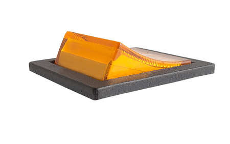 orange power switch at position, isolated macro closeup