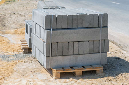 Tile blocks on pallets lie next to each other on the streetの写真素材