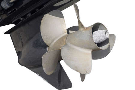 aluminum 3-blade boat propeller on hub of outboard motor close upの写真素材