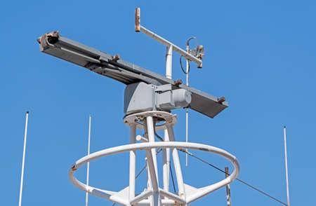 Ships antenna and navigation system in a blue sky
