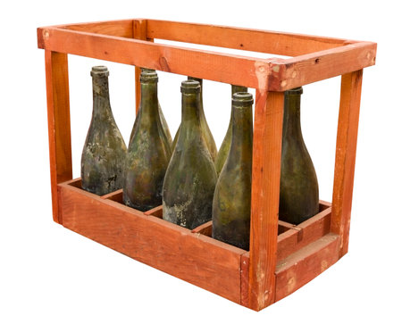 old bottles of champagne in wooden champagne crate on a white backgroundの写真素材