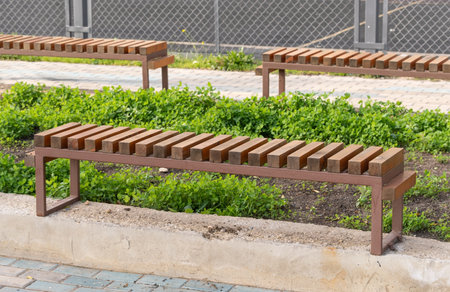 Wooden bench in the city parkの写真素材