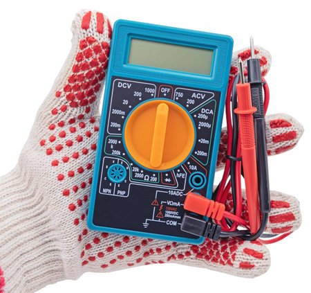 Hand in protective glove holds digital tester on white background