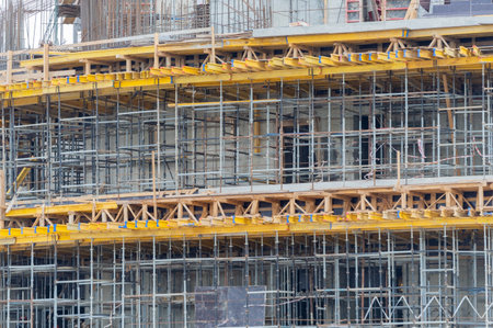 Construction of buildings using monolithic technology. Reinforced concrete frame of the building,...