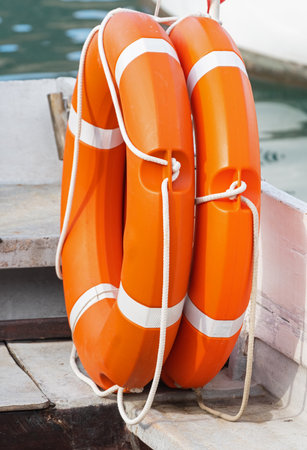the red rescue rings on a shipの写真素材