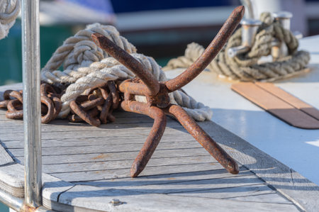 anchor and rope on prow of boatの写真素材