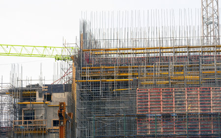 Construction of buildings using monolithic technology. Reinforced concrete frame of the building, reinforcement, formwork for pouring concrete.の写真素材