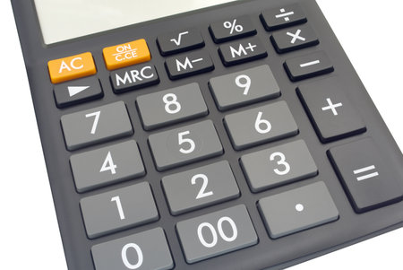 Calculator keyboard with numbers on white backgroundの写真素材