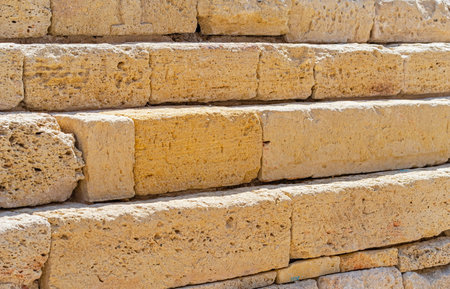 Texture of old stone wall at fortress as backgroundの写真素材