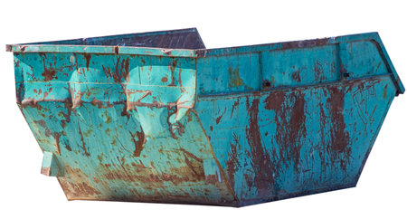 Old green metal garbage container on white background