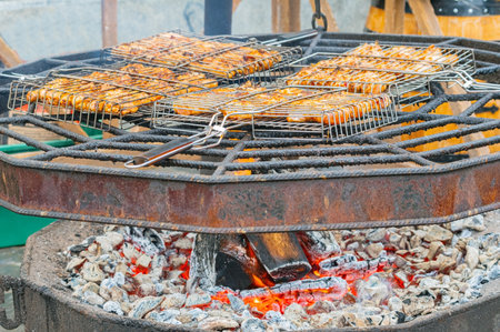 fresh meat frying on the grill