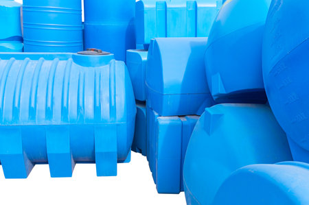 Blue plastic water and liquids barrel storage industrial containers isolated on white background