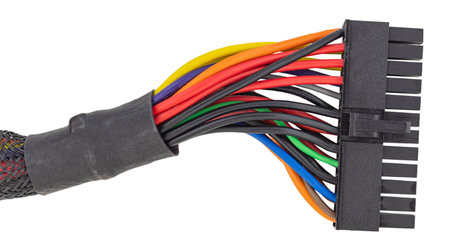 PSU cable. 20 and 4 pin plug for connecting the computer motherboard to the power supply white backgroundの写真素材