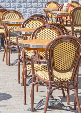 the chairs and tables in the summer cafeの写真素材