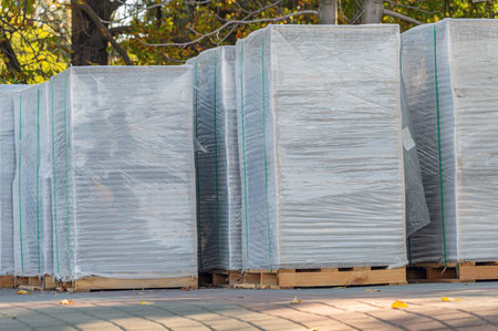 Tile blocks on pallets lie next to each other on the street